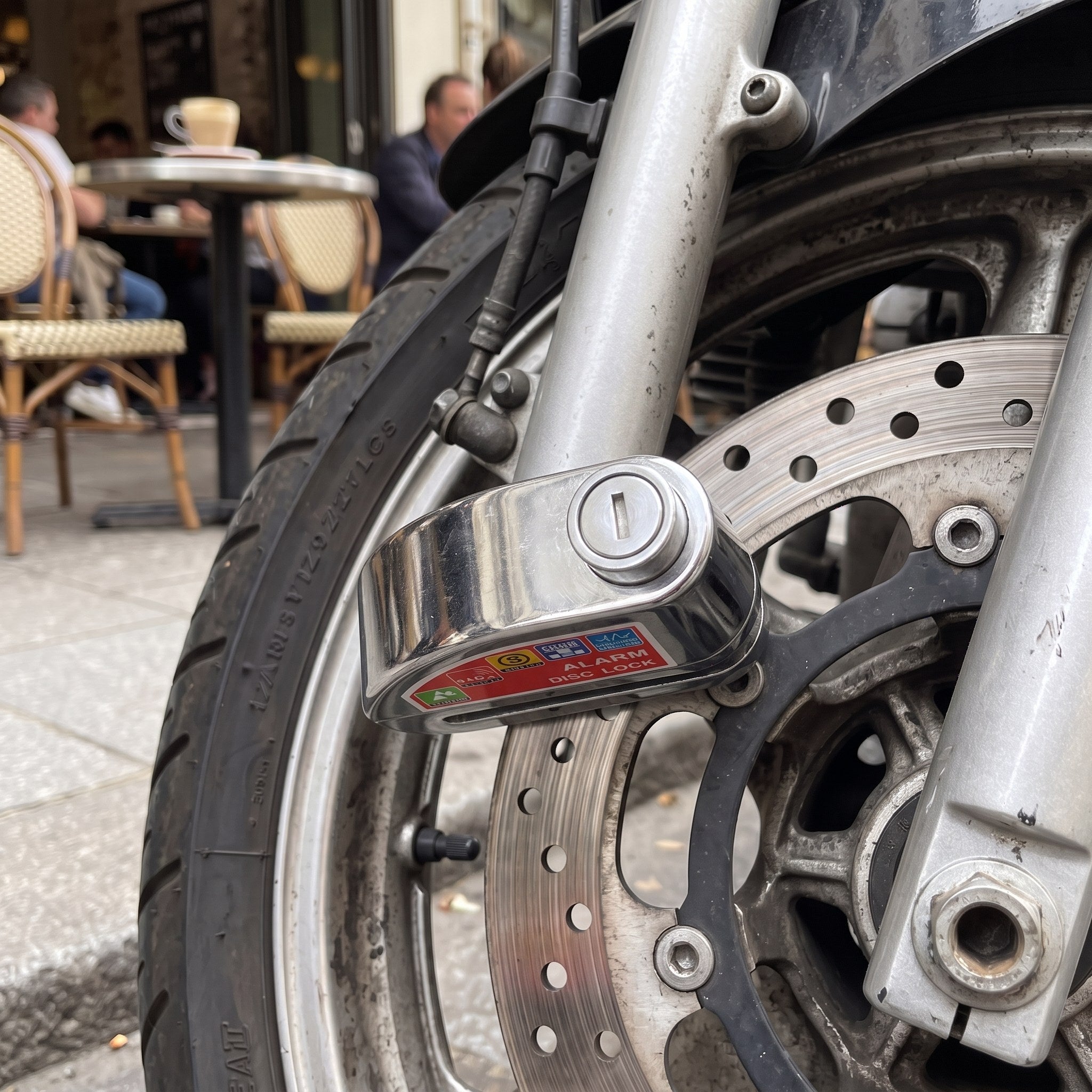 Silver RideLatch at a café parking stop
