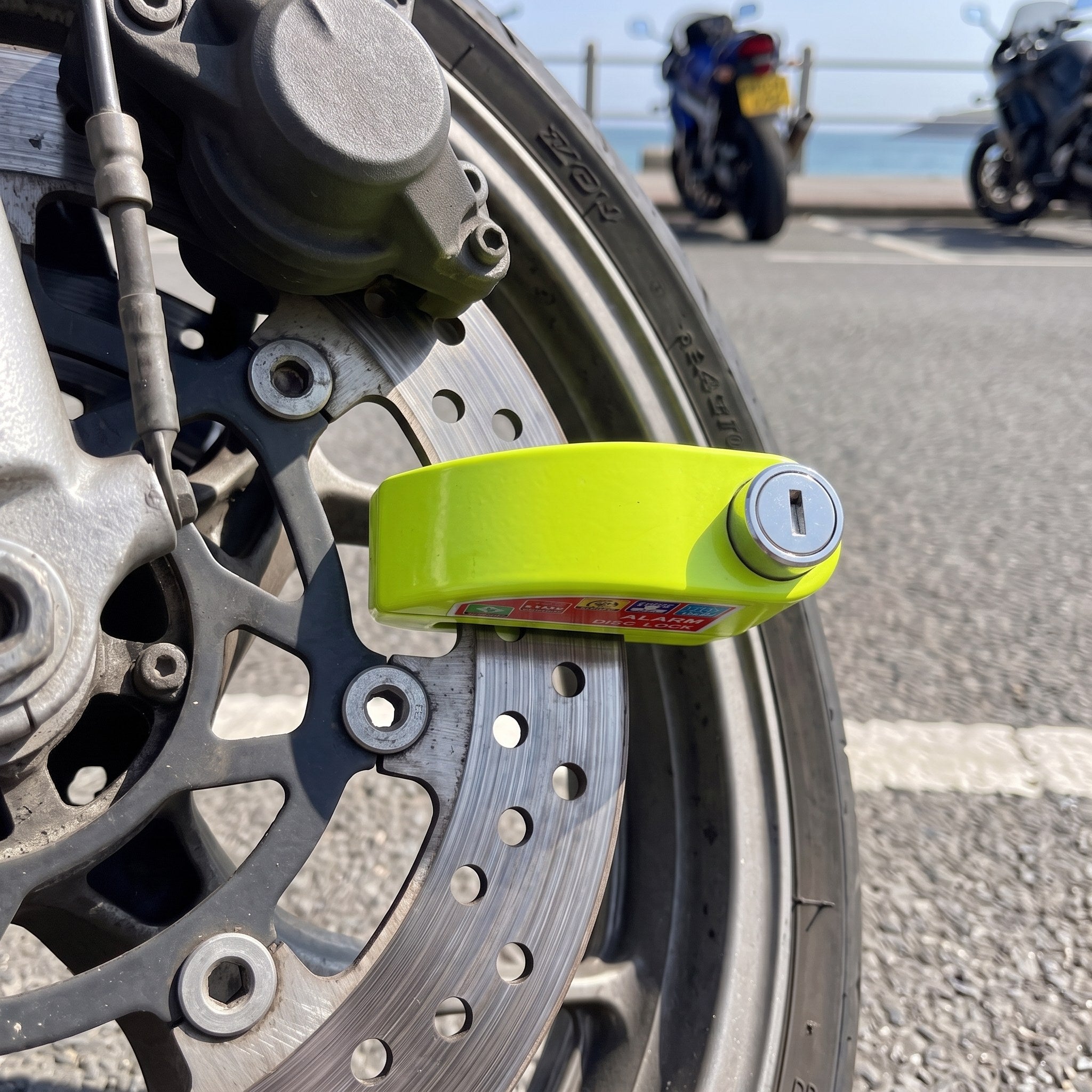 Green RideLatch on a brake disc